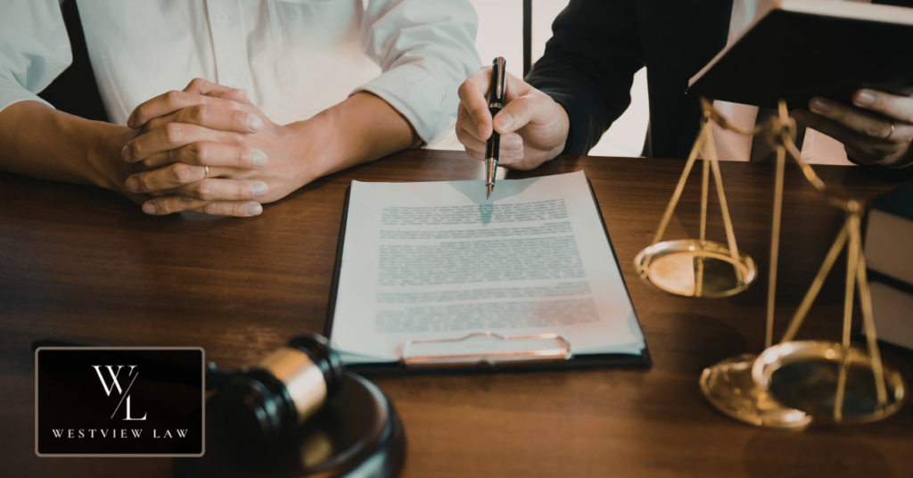 Lawyer discussing financial compensation options with workplace harassment victim