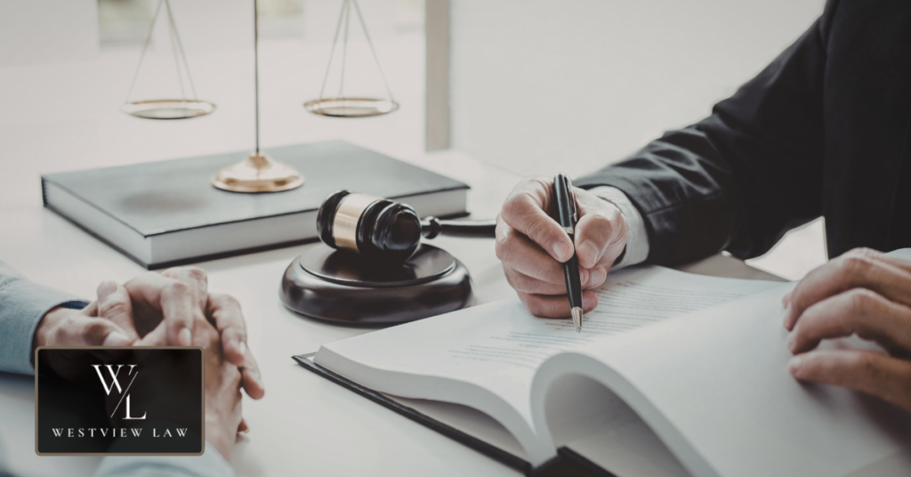 Employment lawyer consulting with client about disability discrimination case