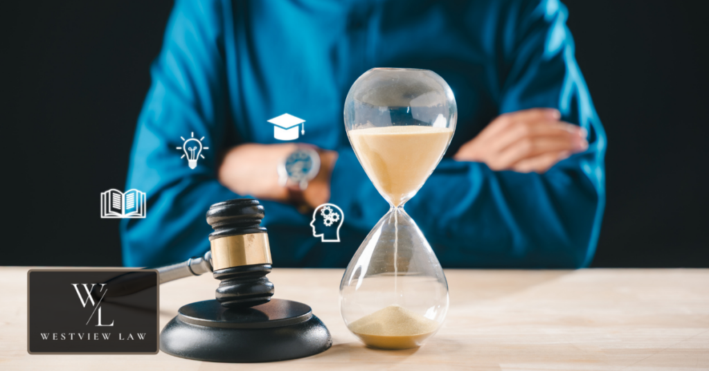 Employee reviewing deadlines and documents to avoid mistakes in legal claim