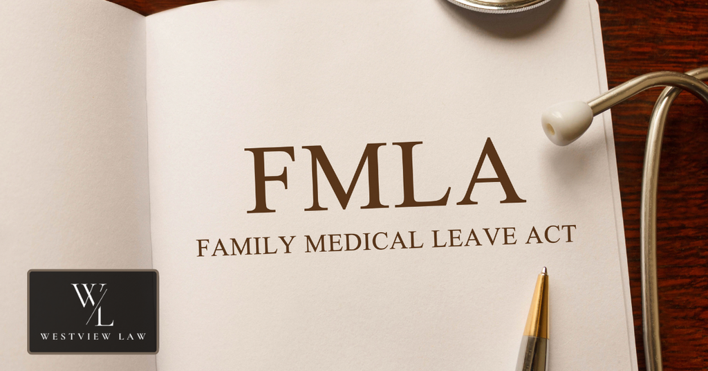 Open book displaying FMLA and Family Medical Leave Act text, with a stethoscope and pen representing federal medical leave protections.