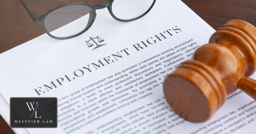 Employment rights document with a wooden judge's gavel and eyeglasses, representing California employee protections and workplace accommodation laws.