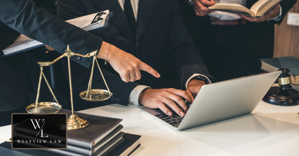 Legal Support for FMLA Intermittent Leave Rights Employment attorney reviewing an FMLA leave case with scales of justice, representing legal support from Westview Law