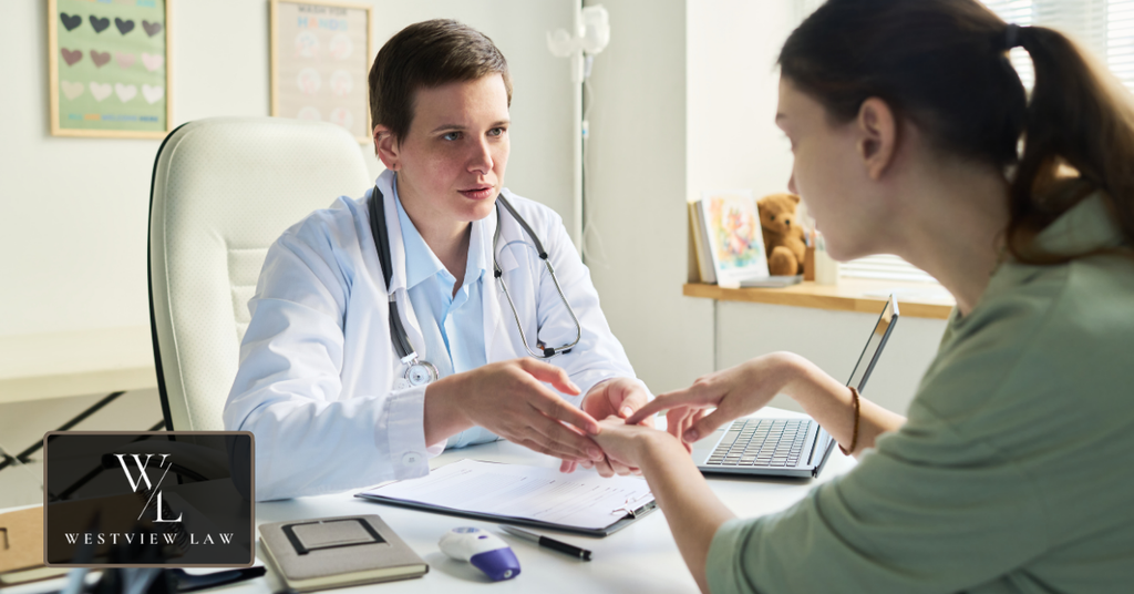 Doctor consulting with a patient about a medical condition that may qualify for FMLA leave.
