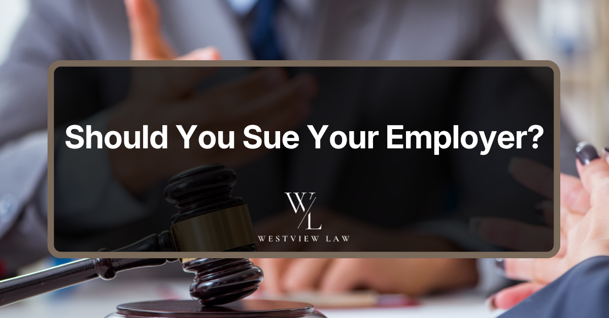 Employment law consultation with a judge’s gavel representing a potential lawsuit against an employer.