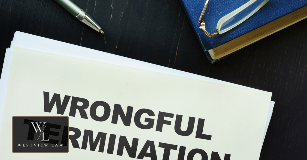 Wrongful termination document on a desk representing an employee’s potential legal claim after being unlawfully fired in California.
